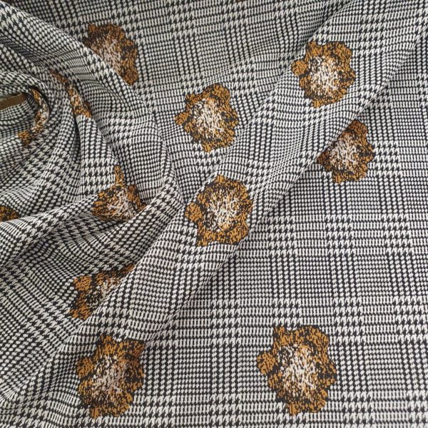 Stretchy, Prince of Wales Check, over printed with an Ochre flower