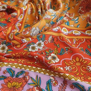 Border Printed Viscose in bold Orange/Red/Gold/Mauve