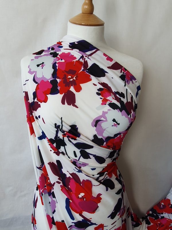 Big Bold Floral of Reds/Purples in a Micro Jersey stretch 'Portia 5599' by John Kaldor